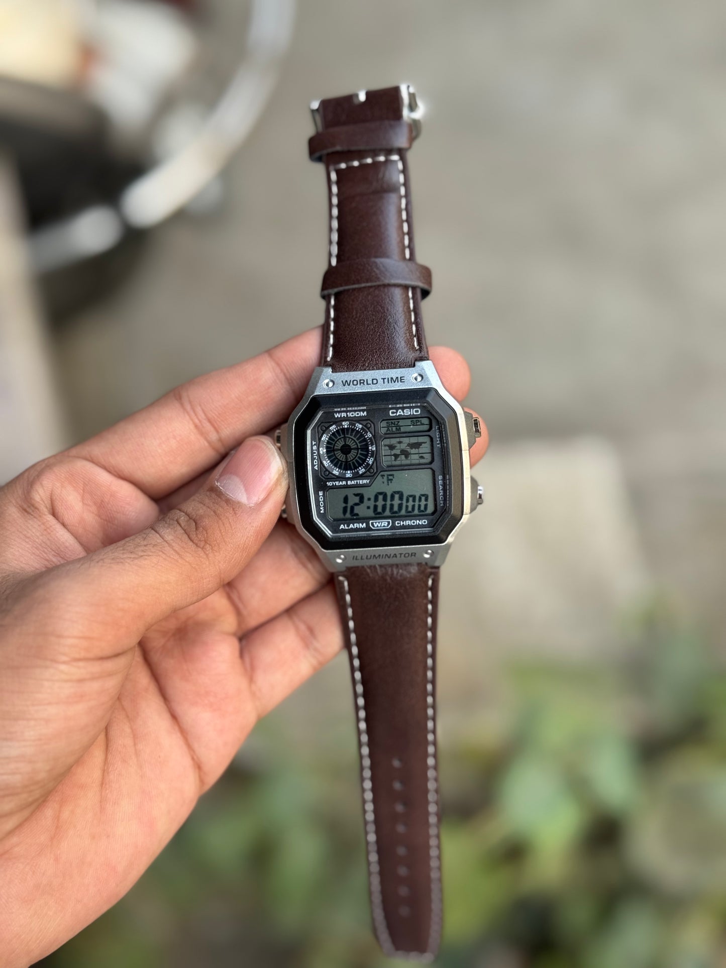 SB PREMIUM ILUMINATOR REGULAR SILVER BODY DARK BROWN DIGITAL WATCH