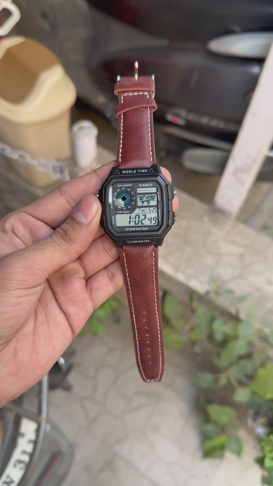 SB PREMIUM ILUMINATOR REGULAR BLACK BODY  BROWN BELT DIGITAL WATCH