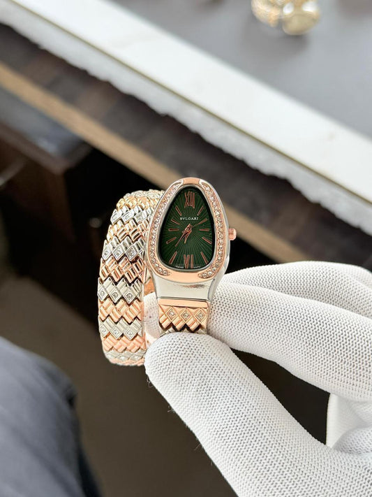 Bulgari Snake Diamond Belt 
Two tone rose green Dial Womens Watch