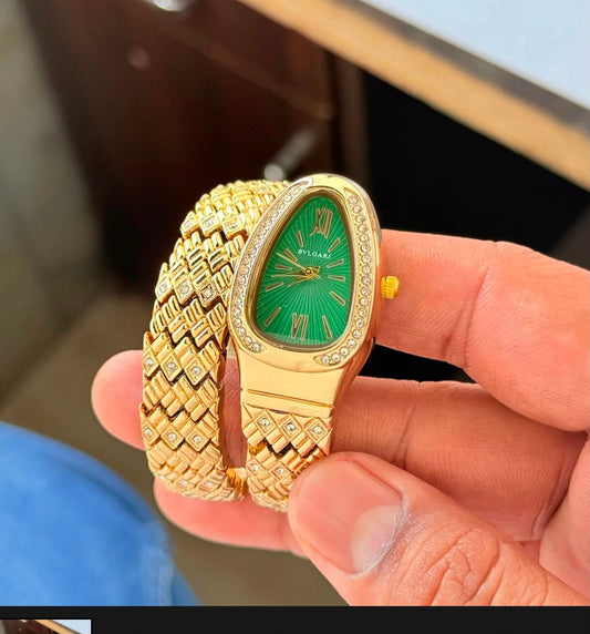 Bulgari Snake Diamond Belt 
gold green Dial Womens Watch