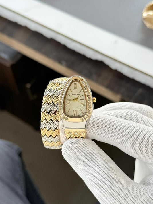 Bulgari Snake Diamond Belt 
Two tone gold gold Dial Womens Watch