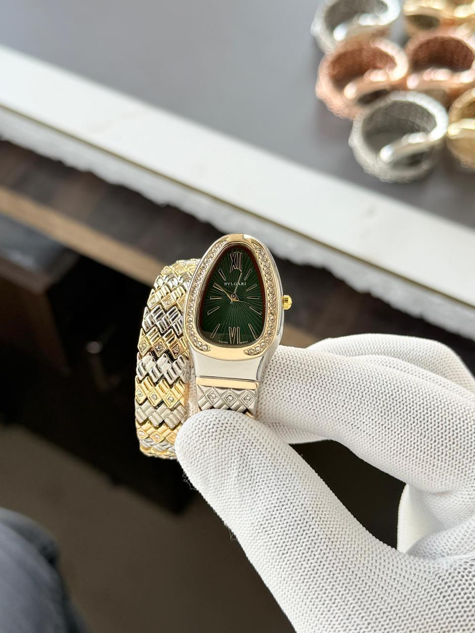 Bulgari Snake Diamond Belt 
Two tone gold green Dial Womens Watch